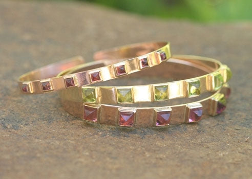 Wide Spring Gold Bangle with Pyramid Cabochons